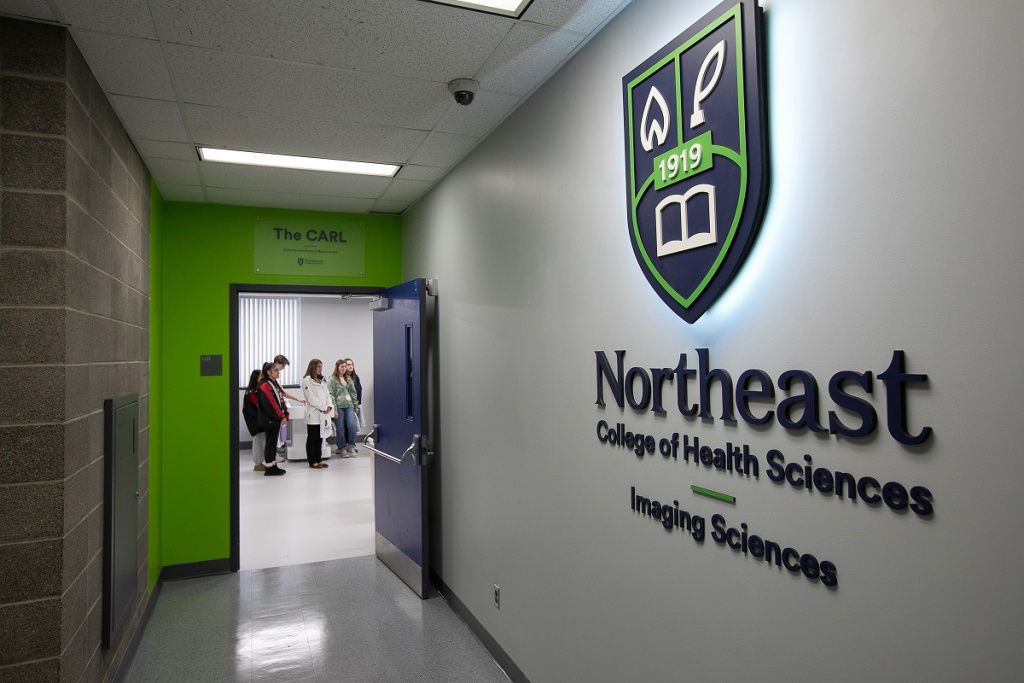 Signage inside the Northeast College of Health Sciences new Imaging Sciences wing, with a look inside The CARL virtual anatomy lab, located on its Seneca Falls, N.Y., campus.
